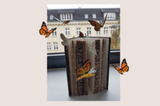 Schmetterlings-Book Nook: Ein Buch in dem Schmetterlinge stecken.