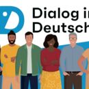 Frauen und Männer mit Kaffeebechern an einem Tisch
