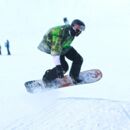 Snowboarder beim Sprung