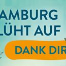 Hamburg blüht auf, Dank dir! in blauer und orangener Farbe und Schrift.