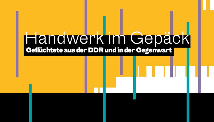Schriftzug Handwerk im Gepäck vor gelb-schwarzem Hintergrund