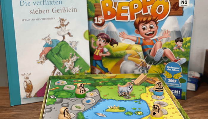 Buch "Die verflixten sieben Geißlein" und Spiel "Beppo"