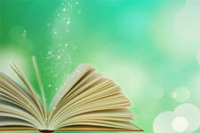 Aufgeschlagenes Buch mit Hintergrund