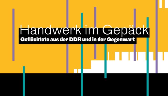 Schriftzug Handwerk im Gepäck vor gelb-schwarzem Hintergrund